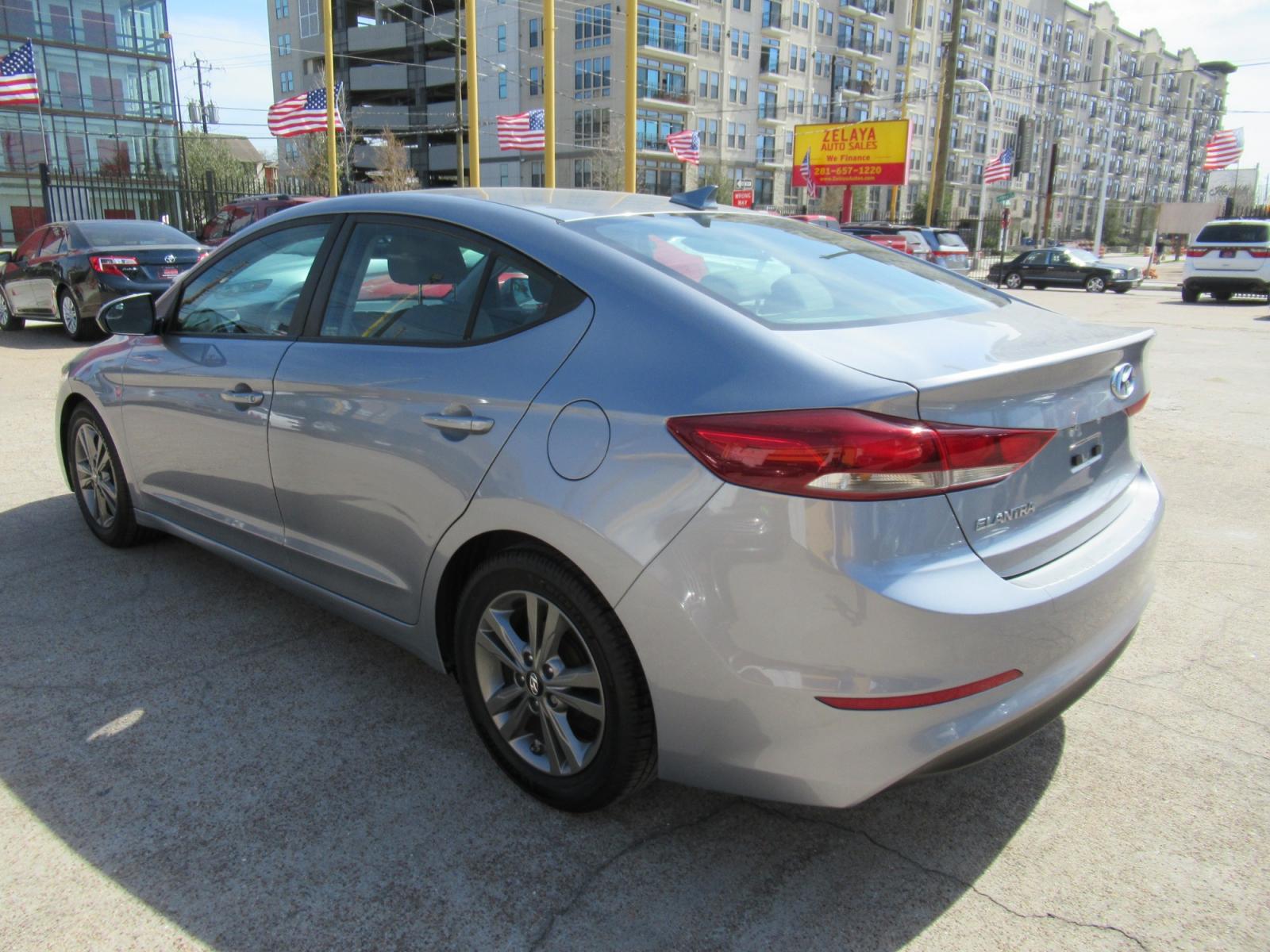 2017 Gray /Gray Hyundai Elantra Limited (5NPD84LF0HH) with an 1.8L L4 DOHC 16V engine, 6A transmission, located at 1511 North Shepherd Dr., Houston, TX, 77008, (281) 657-1221, 29.798361, -95.412560 - 2017 HYUNDAI ELANTRA SE/VALUE/LIMITED VIN: 5NPD84LF0HH003268 5 N P D 8 4 L F 0 H H 0 0 3 2 6 8 SEDAN 4 DR 2.0L I4 F DOHC 16V GASOLINE FRONT WHEEL DRIVE - Photo #16